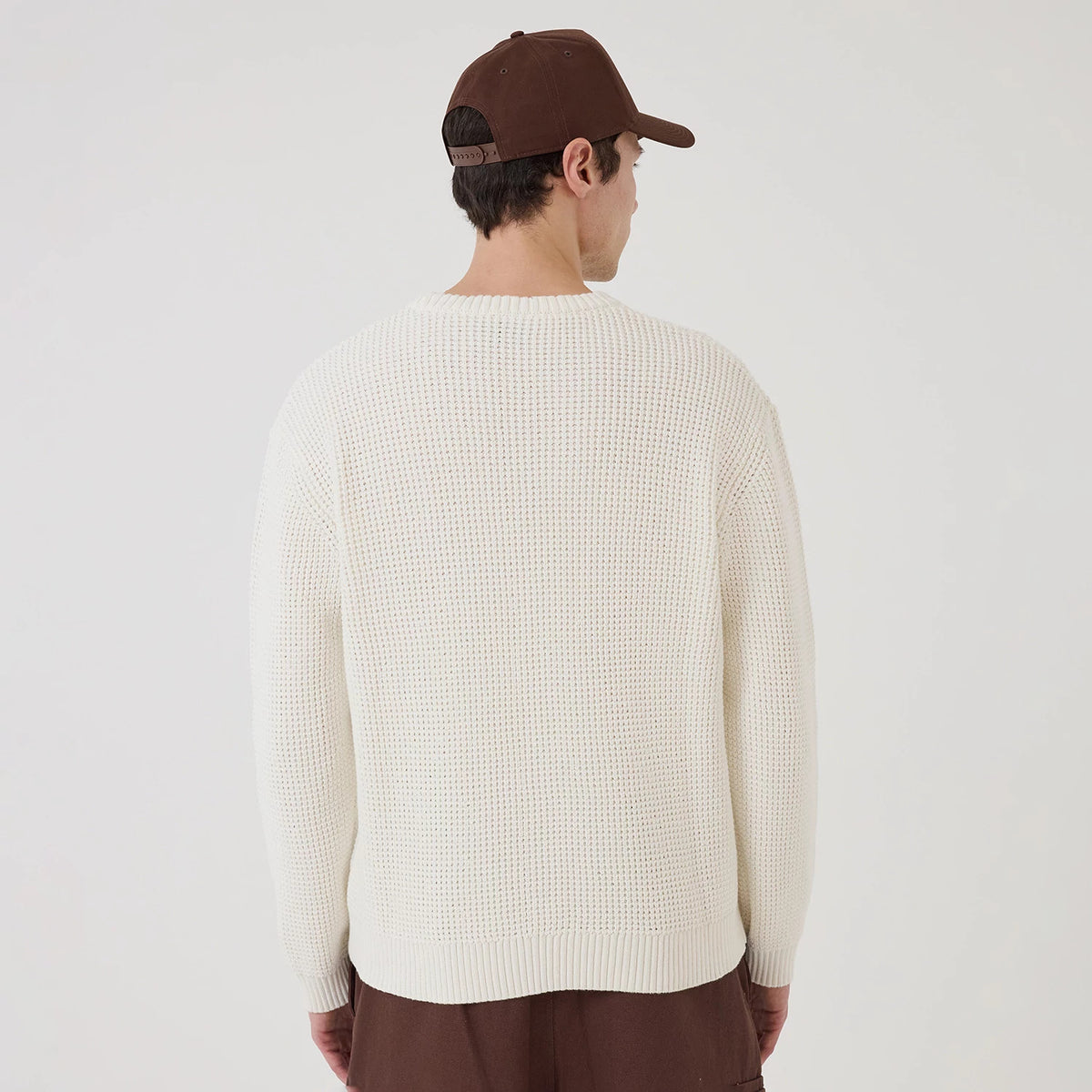 The model is wearing this MLB Waffle Knit LA Dodgers Crew Neck Sweater in open white. 2