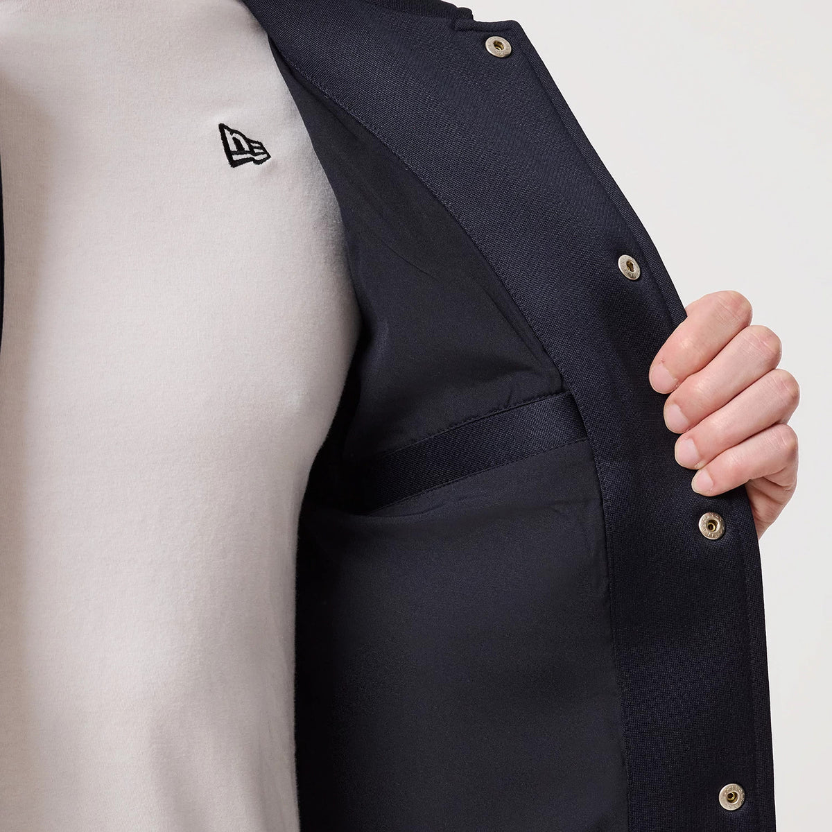 The model is wearing this MLB New York Yankees Collared Jacket in navy. 6