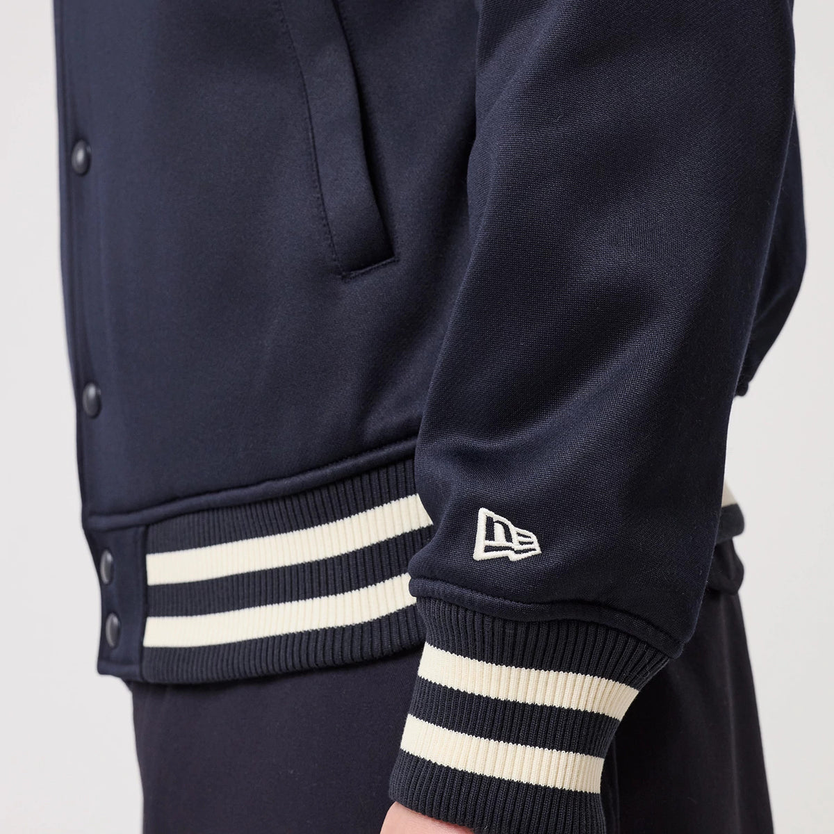 The model is wearing this MLB New York Yankees Collared Jacket in navy. 7