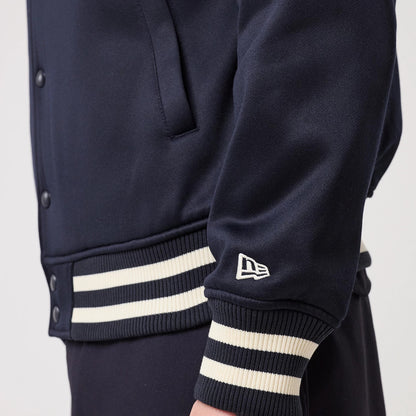 The model is wearing this MLB New York Yankees Collared Jacket in navy. 7