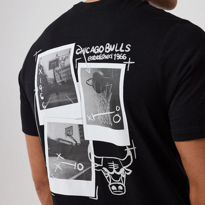 The model is wearing this NBA Graphic Chicago Bulls T-Shirt in black. 7