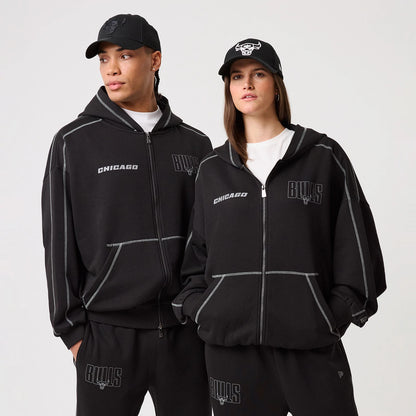 The model is wearing this NBA Graphic Chicago Bulls Pullover Hoodie in black. 1