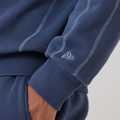 The model is wearing this NBA Graphic LA Lakers Crew Neck Sweater in dark blue. 7