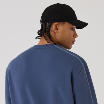 The model is wearing this NBA Graphic LA Lakers Crew Neck Sweater in dark blue. 6