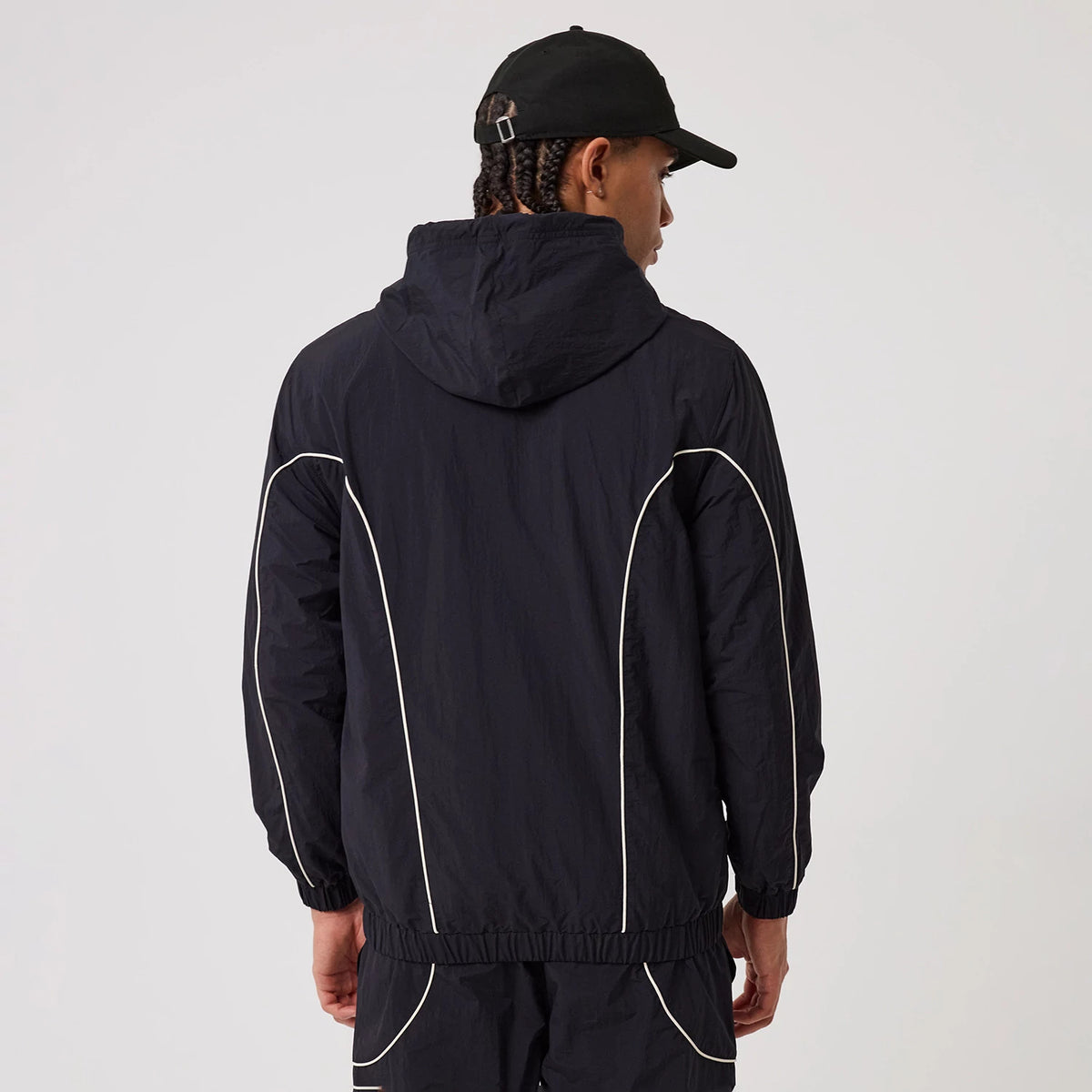 The model is wearing this MLB Piping New York Yankees Track Jacket in navy. 2