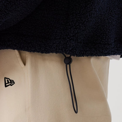 The model is wearing this MLB New York Yankees Sherpa Jacket in dark blue. 6