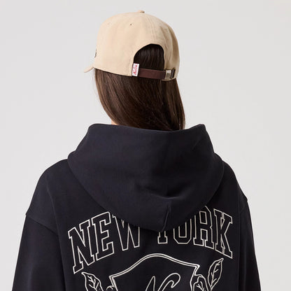 The model is wearing this New Era Crest Graphic Pullover Hoodie in navy. 6