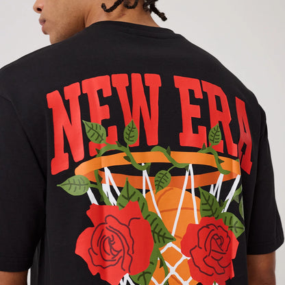 The model is wearing this New Era Floral Graphic T-Shirt in black. 8