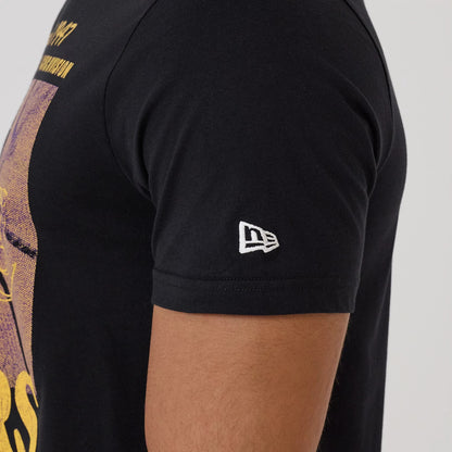 The model is wearing this NBA Graphic LA Lakers T-Shirt in black. 5