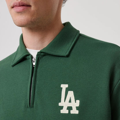 The model is wearing this MLB LA Dodgers 1/4 Zip Sweater in dark green. 5