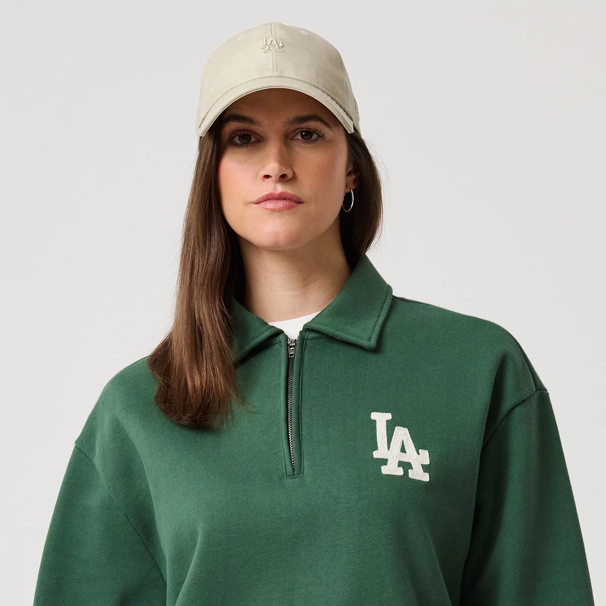 The model is wearing this MLB LA Dodgers 1/4 Zip Sweater in dark green. 6