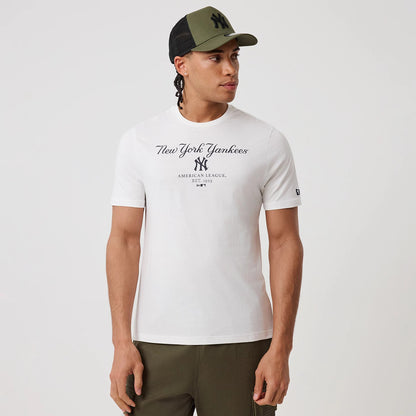 The model is wearing this MLB Linear New York Yankees T-Shirt in white. 3
