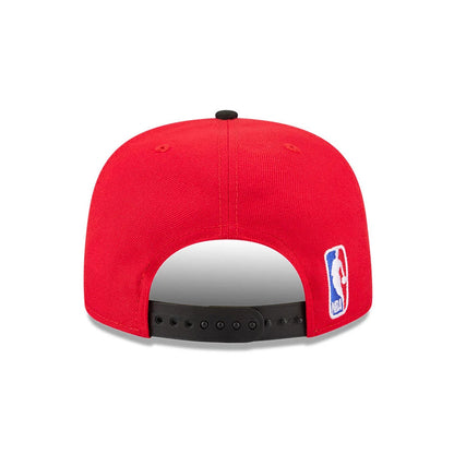 Chicago Bulls NBA Tip Off 2026 Red New Era 9FIFTY A-Frame Snapback Adjustable Cap, rear view showing the NBA logo embroidered on the bottom right back panel, with a black adjustable plastic snap closure.