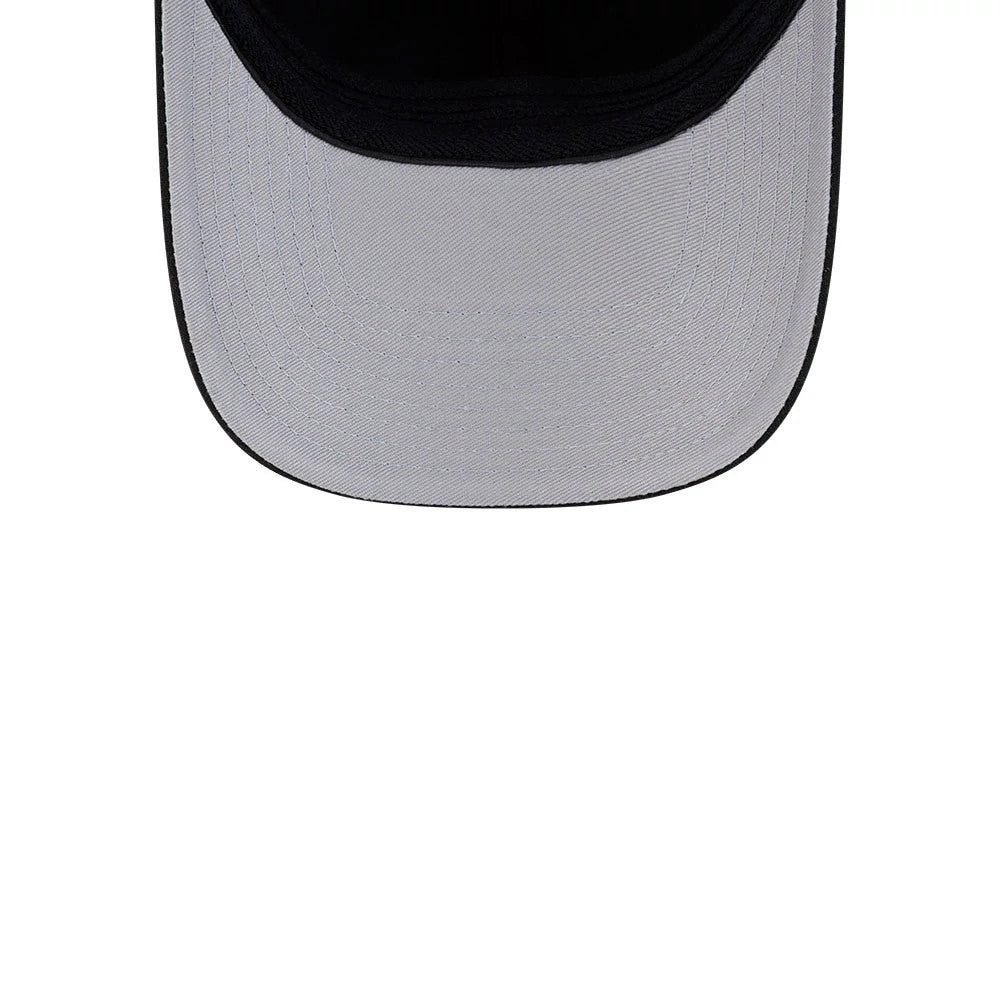 LA Kings NHL Team Black New Era 39THIRTY M-Crown Stretch Fit Cap, inside view showing the grey undervisor with fine stitching, the black interior sweatband encircling the cap, and part of the cap's structure extending around the head.