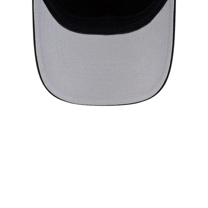 LA Kings NHL Team Black New Era 39THIRTY M-Crown Stretch Fit Cap, inside view showing the grey undervisor with fine stitching, the black interior sweatband encircling the cap, and part of the cap's structure extending around the head.