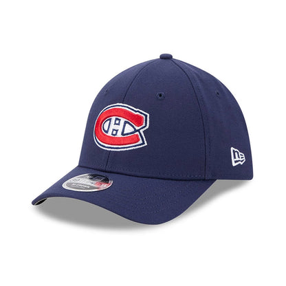 Montreal Canadiens NHL Team Navy New Era 39THIRTY M-Crown Stretch Fit Cap, front view showing the raised red and white embroidered team logo on the structured navy crown, with a grey curved visor and a 39THIRTY size sticker on the front panel.