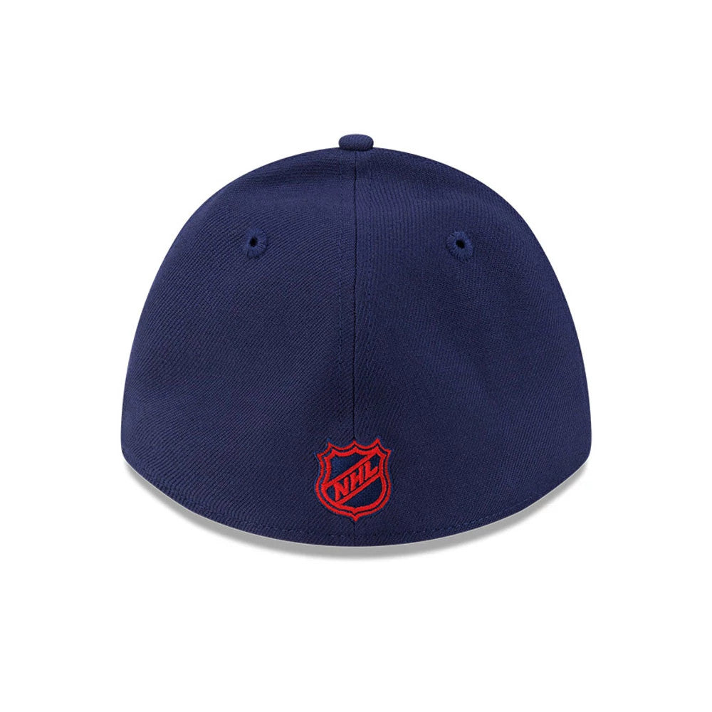 Montreal Canadiens NHL Team Navy New Era 39THIRTY M-Crown Stretch Fit Cap, rear view showing the red embroidered NHL shield logo centred on the navy back panels, with two eyelets and a navy top button completing the design.