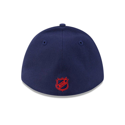 Montreal Canadiens NHL Team Navy New Era 39THIRTY M-Crown Stretch Fit Cap, rear view showing the red embroidered NHL shield logo centred on the navy back panels, with two eyelets and a navy top button completing the design.