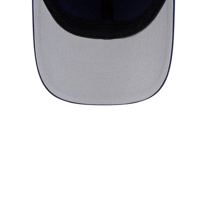 Montreal Canadiens NHL Team Navy New Era 39THIRTY M-Crown Stretch Fit Cap, inside view showing a grey undervisor, a navy blue sweatband lining, and black seam taping along the curved inner edge of the visor.
