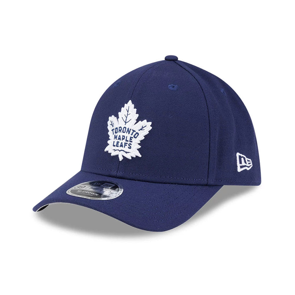 Toronto Maple Leafs NHL Team Navy New Era 39THIRTY M-Crown Stretch Fit Cap, front view showing a white embroidered team logo on the navy structured crown, a curved visor with a 39THIRTY size sticker, and the New Era flag logo on the left side.