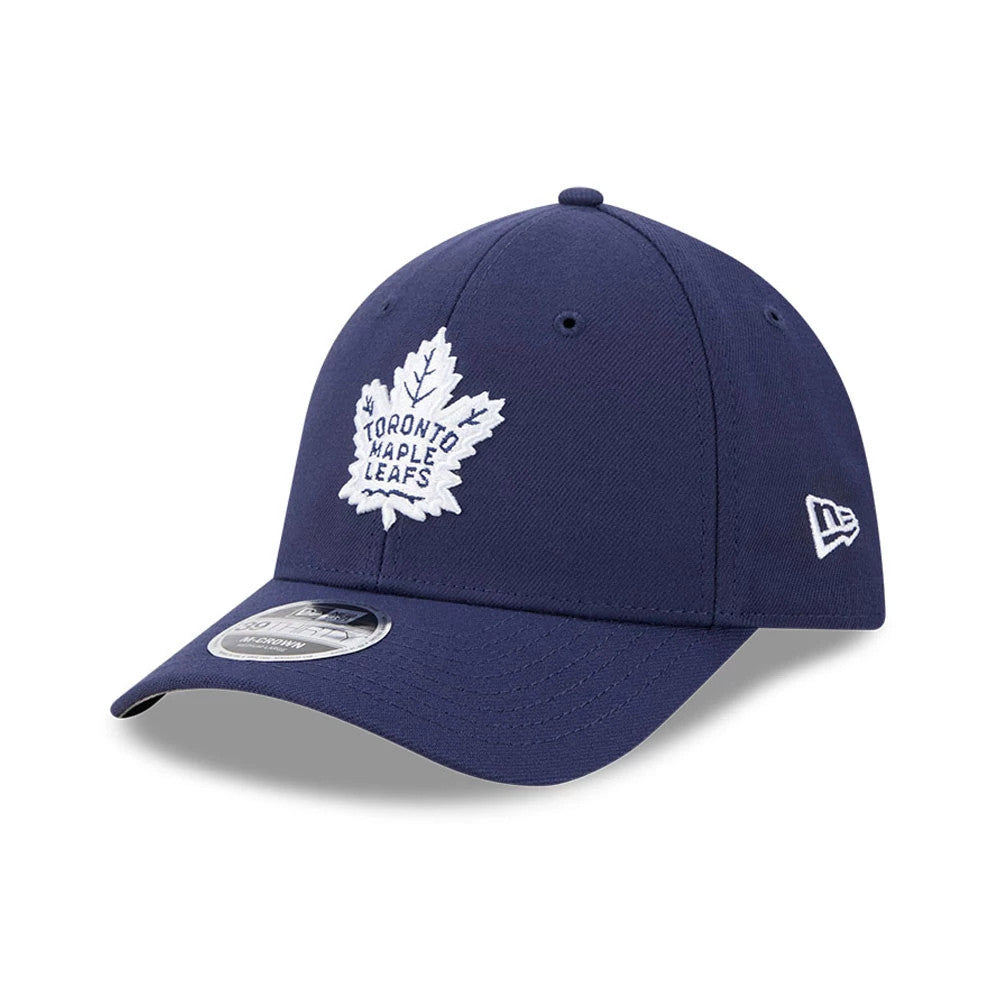 Toronto Maple Leafs NHL Team Navy New Era 39THIRTY M-Crown Stretch Fit Cap, three-quarter view showing the white embroidered team logo on the front panel, matching navy curved visor with a 39THIRTY size sticker.
