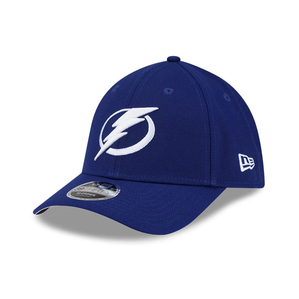 Tampa Bay Lightning NHL Team Dark Blue New Era 39THIRTY M-Crown Stretch Fit Cap, front view showing the raised white embroidered lightning bolt logo on the front panel, with a curved visor and a 39THIRTY size sticker.