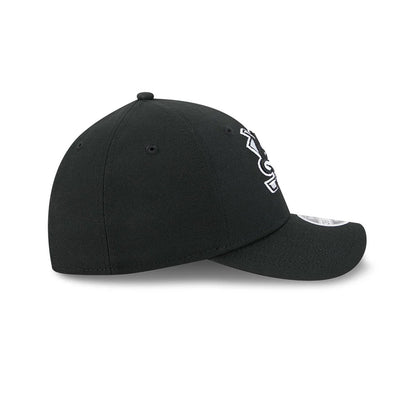 Anaheim Ducks NHL Black New Era 39THIRTY M-Crown Stretch Fit Cap, side view showing the white and black embroidered team logo on the structured crown, with a curved black visor and the New Era flag logo embroidered on the left side.