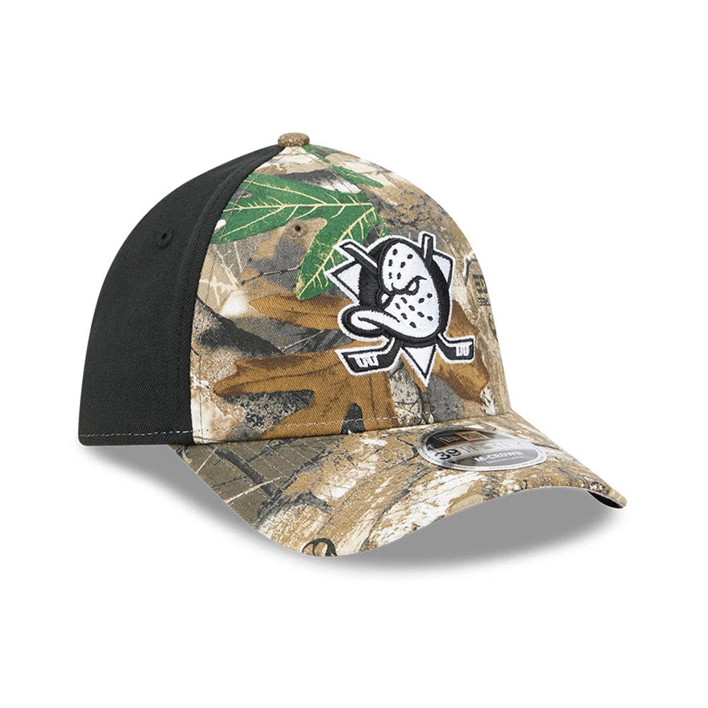 Anaheim Ducks NHL Realtree Camo New Era 39THIRTY M-Crown Stretch Fit Cap, three-quarter view showing the raised embroidered Ducks logo on the front panel, a camouflage pattern crown, and a 39THIRTY size sticker on the curved visor.