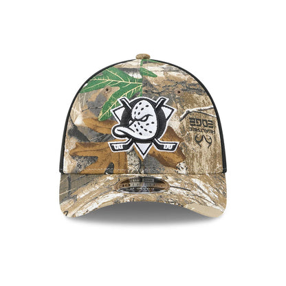 Anaheim Ducks NHL Realtree Camo New Era 39THIRTY M-Crown Stretch Fit Cap, front view showing the raised embroidered Anaheim Ducks logo on the camo print crown, with a black 39THIRTY size sticker on the curved visor.