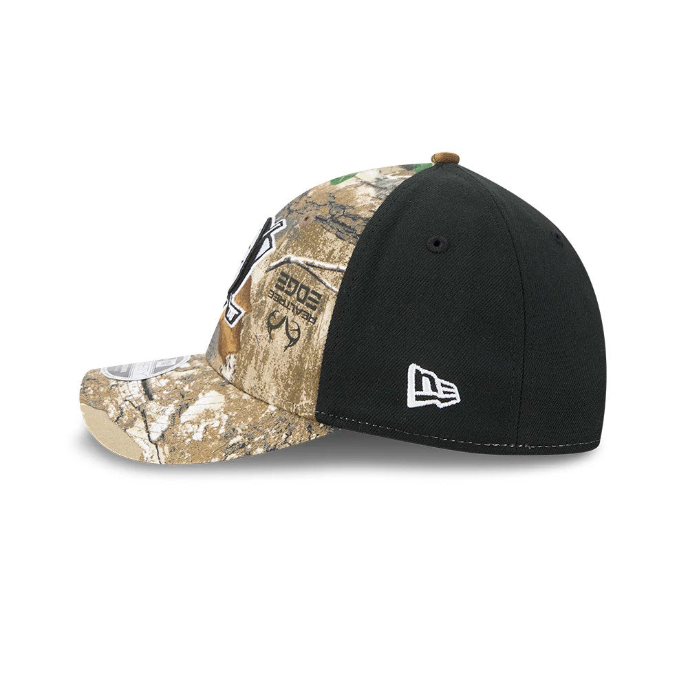 Anaheim Ducks NHL Realtree Camo New Era 39THIRTY M-Crown Stretch Fit Cap, side view showing the embroidered white New Era flag logo on the black mesh crown, with a camo front panel featuring an embroidered team logo.
