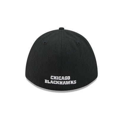 Chicago Blackhawks NHL Black New Era 39THIRTY M-Crown Stretch Fit Cap, rear view showing the white embroidered Chicago Blackhawks lettering on the centre of the back panels, with the slightly curved black visor at the bottom.