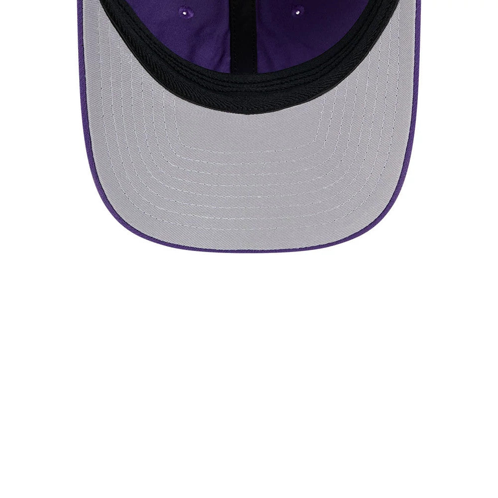 LA Lakers NBA Team Purple New Era 39THIRTY M-Crown Stretch Fit Cap, inside view showing a grey undervisor with purple trim, a black sweatband, and purple stitching on the structured crown panels.