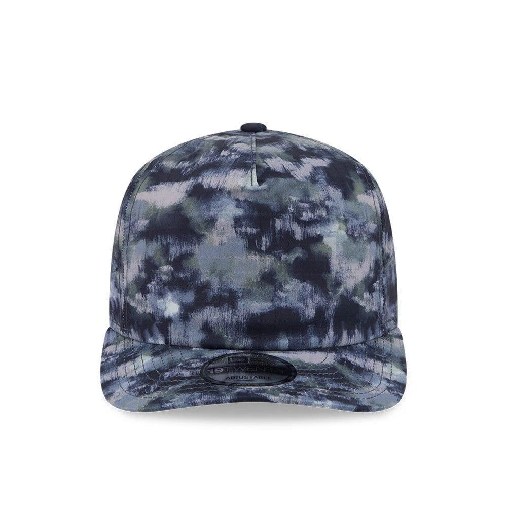 New Era Elevated Basics All Over Print 19TWENTY Adjustable Cap, front view showing a unique abstract all-over pattern in shades of blue and grey on the structured crown and curved visor, with a black 19TWENTY size sticker on the visor.