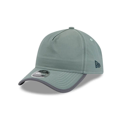 Pictured is this New Era Elevated Basics 9FORTY A-Frame Unstructured cap in open green. 1