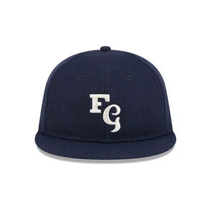 Pictured is this Fear Of God X MLB New York Yankees Retro Crown 59FIFTY Fitted cap in navy. 3