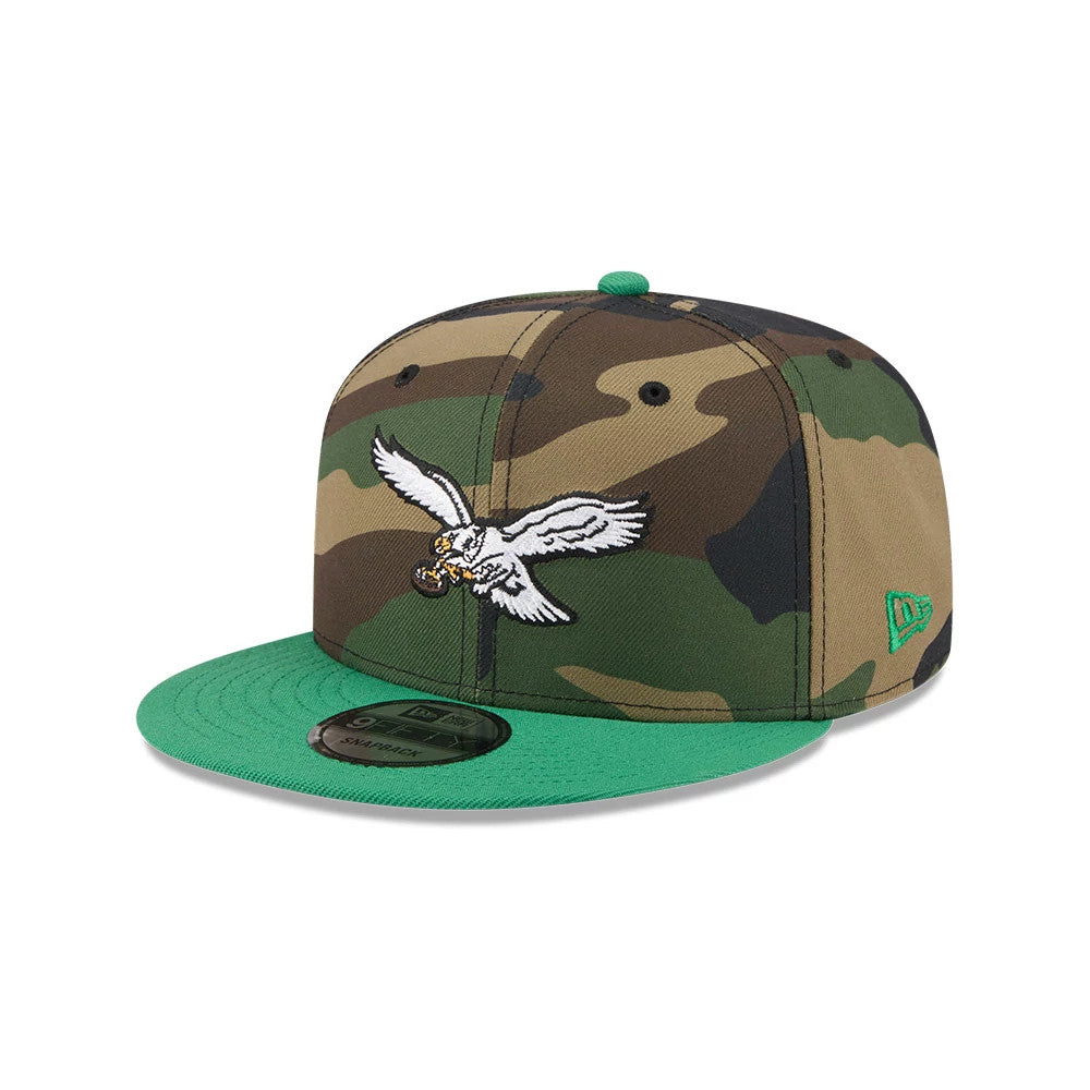Pictured is this NFL Philadelphia Eagles 9FIFTY Snapback cap in camo & green. 4