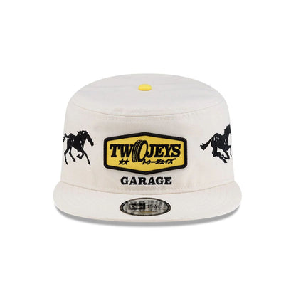 Pictured is this Twojeys X New Era Garage Pillbox Adjustable cap in Cream. 3