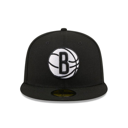 Brooklyn Nets NBA X J-FROST Black New Era 59FIFTY Fitted Cap, front view showing the raised embroidered white and black B-ball graphic on the front panel, a flat black visor and the gold 59FIFTY size sticker prominently displayed.