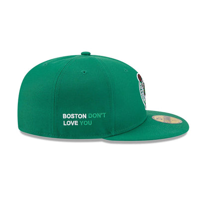 Boston Celtics NBA X J-FROST Green New Era 59FIFTY Fitted Cap, side view showing the green embroidered wording Boston Don't Love You in white and green on the mid-panel, with a golden 59FIFTY size sticker on the flat green visor.