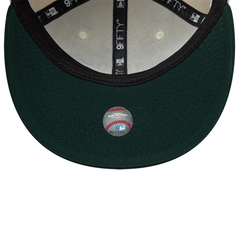 Pictured is this MLB Ombre Script Athletics 9FIFTY Snapback cap in light beige & dark green. 7