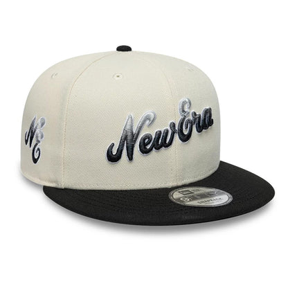 Pictured is this New Era Ombre Script 9FIFTY Snapback cap in light beige. 1