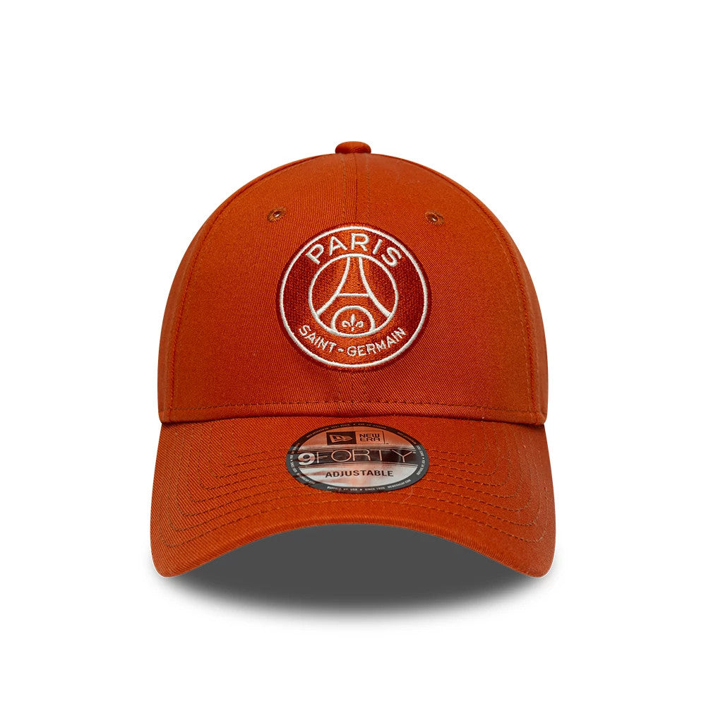 Paris Saint-Germain Red New Era 9FORTY Adjustable Cap, front view showing the white embroidered Paris Saint-Germain emblem centred on the structured red crown, with a matching red curved visor and a 9FORTY size sticker on the visor.