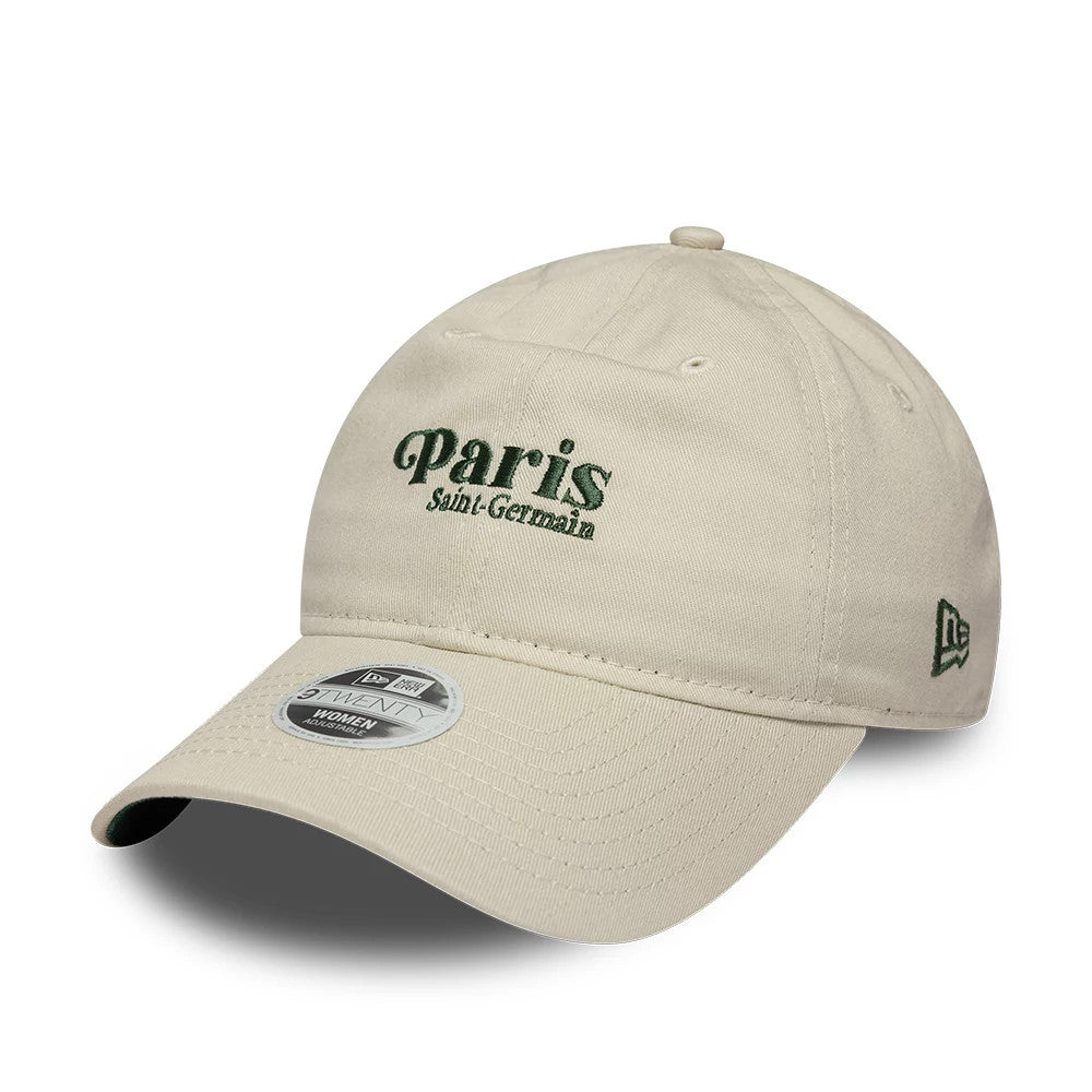Paris Saint-Germain Womens Script Light Beige New Era 9TWENTY Adjustable Cap, three-quarter view showing dark green embroidered Paris Saint-Germain lettering on the front panel, a pre-curved visor with a 9TWENTY size sticker.