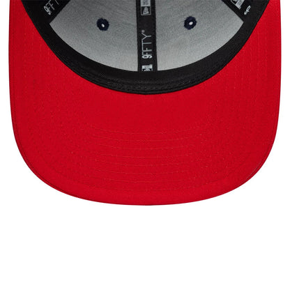 Nets NBA Hardwood Classic Dark Blue New Era 9FIFTY Snapback Adjustable Cap, inside view showing the black sweatband and red undervisor, with silver taping along the interior crown seams and contrasting embroidered eyelets on the grey panels.