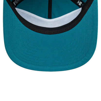 Detroit Pistons NBA Hardwood Classic Turquoise New Era 19TWENTY Adjustable Cap, inside view showing a black sweatband, white mesh taping along the headband, and the same turquoise fabric extending across the undervisor and inner panels.