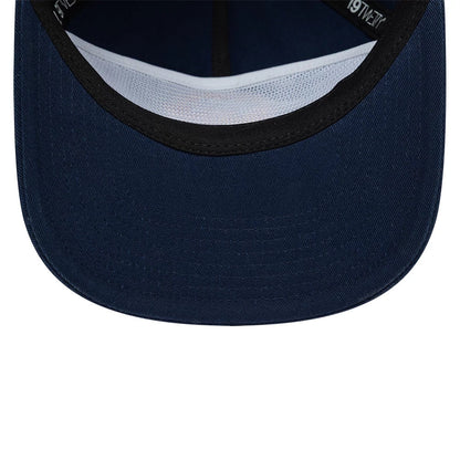 Warriors NBA Hardwood Classic Dark Blue New Era 19TWENTY Adjustable Cap, inside view showing the black sweatband bordering the dark blue undervisor, with white mesh panel lining and 19TWENTY branded taping inside the cap.