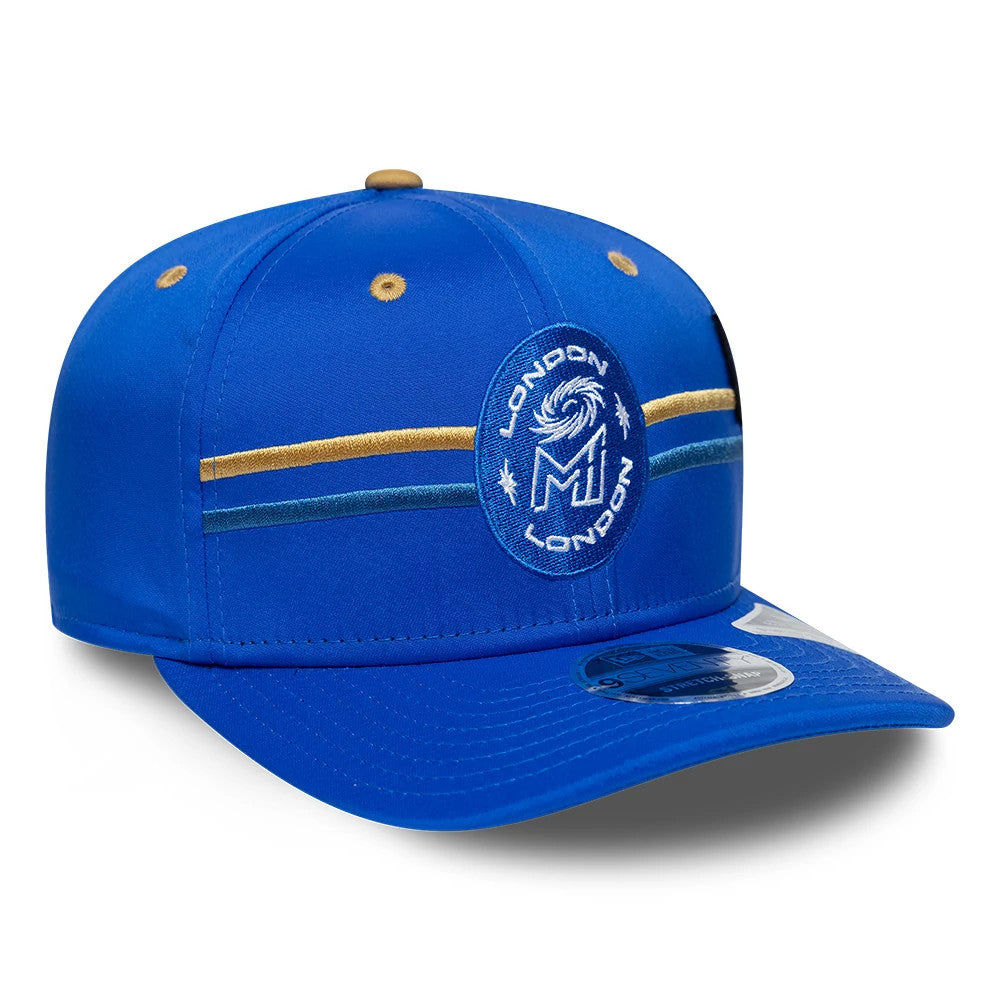 Pictured is this The Hundred 2026 MI London 9SEVENTY Stretch Snap Adjustable cap in bright blue. 3