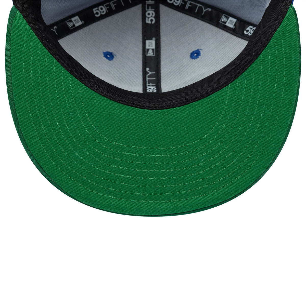 Seattle Seahawks NFL Satin Blue & Green New Era 59FIFTY Fitted Cap, inside view showing green undervisor with contrasting black trim, grey and blue sweatband with coloured eyelets, and branded black taping including size and logo graphics.