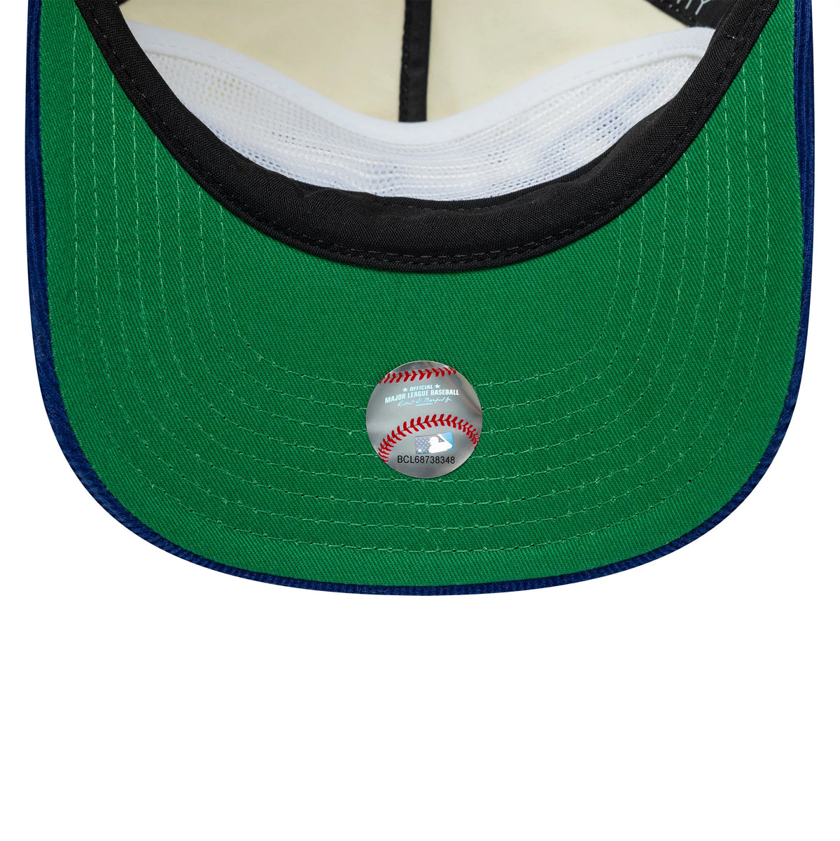 LA Dodgers MLB Retro Dynasty Cord Cream & Blue New Era 19TWENTY Adjustable Cap, inside view showing the green undervisor, white mesh sweatband, black taping and an MLB sticker centred on the undervisor beneath the crown.