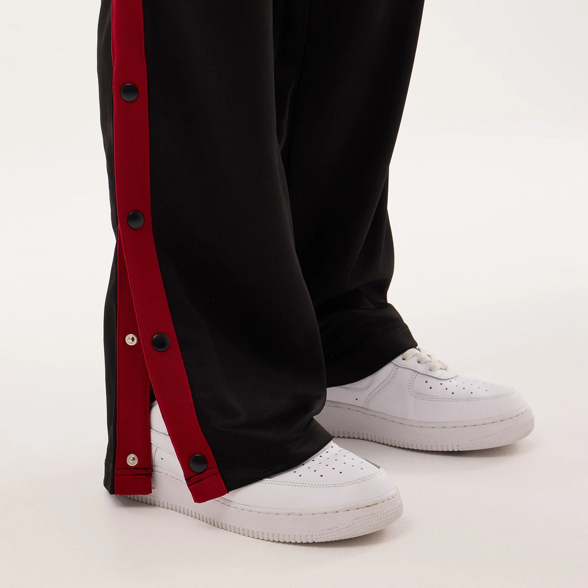 The model is wearing this NBA Hardwood Classic Straight Miami Heat Straight Leg Joggers in black. 6